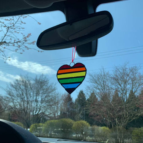 Pride Heart hanging from rear view mirror